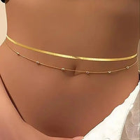 8-piece gold-plated waist chain set with beaded, sequin, and CZ coin designs, adjustable body jewelry by MANDOTOS INTERNATIONAL.