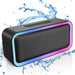 Mandotos International ACOME A6 waterproof Bluetooth speaker with 10W RGB lighting, TWS V5.0, and bass enhancement.