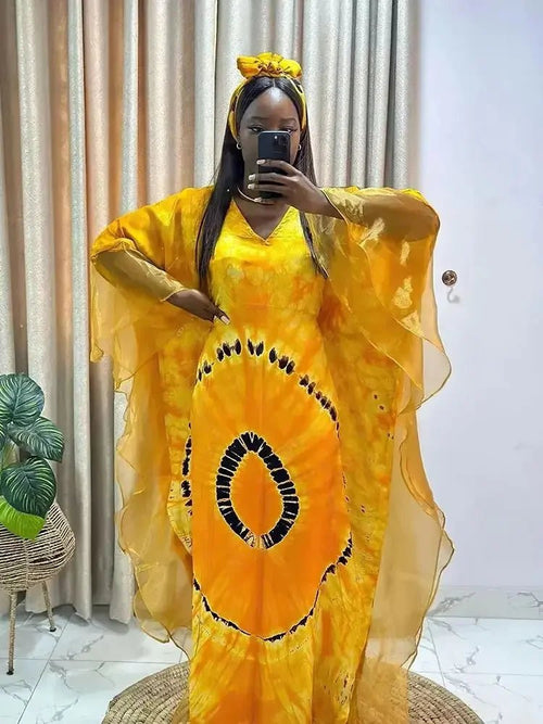 African Dashiki Ankara maxi dress for women, traditional long dress with vibrant patterns by MANDOTOS INTERNATIONAL.