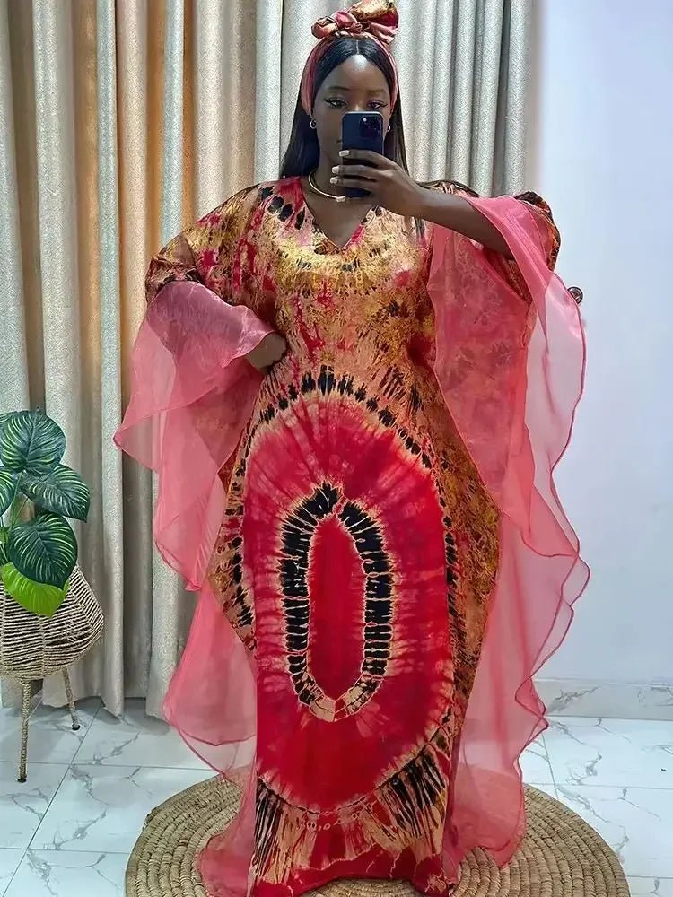African Dashiki Ankara Maxi Dress for women by MANDOTOS INTERNATIONAL, featuring vibrant traditional print and flowing long design.