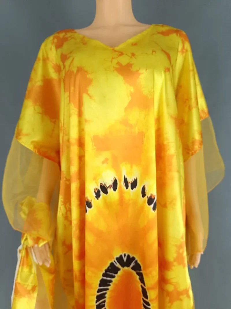 African Dashiki Ankara maxi long dress for women, traditional colorful clothing featuring vibrant patterns and flowing fabric.