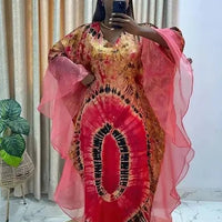 African Dashiki Ankara maxi dress for women, traditional long dress with vibrant patterns by MANDOTOS INTERNATIONAL.