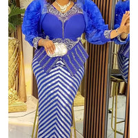 African dress for women by MANDOTOS INTERNATIONAL, plus size sequin evening gown with dashiki and Ankara designs for parties.