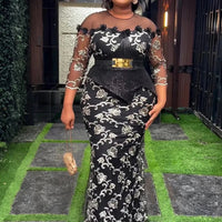 Plus size African dress by MANDOTOS INTERNATIONAL featuring sequin embellishments, long dashiki-style evening gown with Ankara accents.