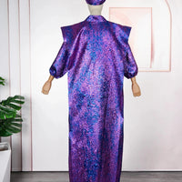 Mandotos International African women’s traditional dress, Ankara dashiki gown with long maxi style, vibrant colors and intricate patterns.