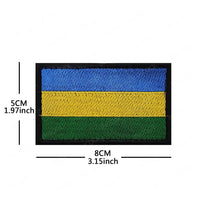 Embroidery patches of African flags and badges featuring Morocco, Nigeria, Gabon, Libya, and Namibia by MANDOTOS INTERNATIONAL.