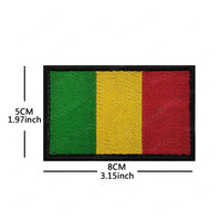 Embroidery patches of African flags including Morocco, Nigeria, Gabon, Libya, and Namibia by MANDOTOS INTERNATIONAL.