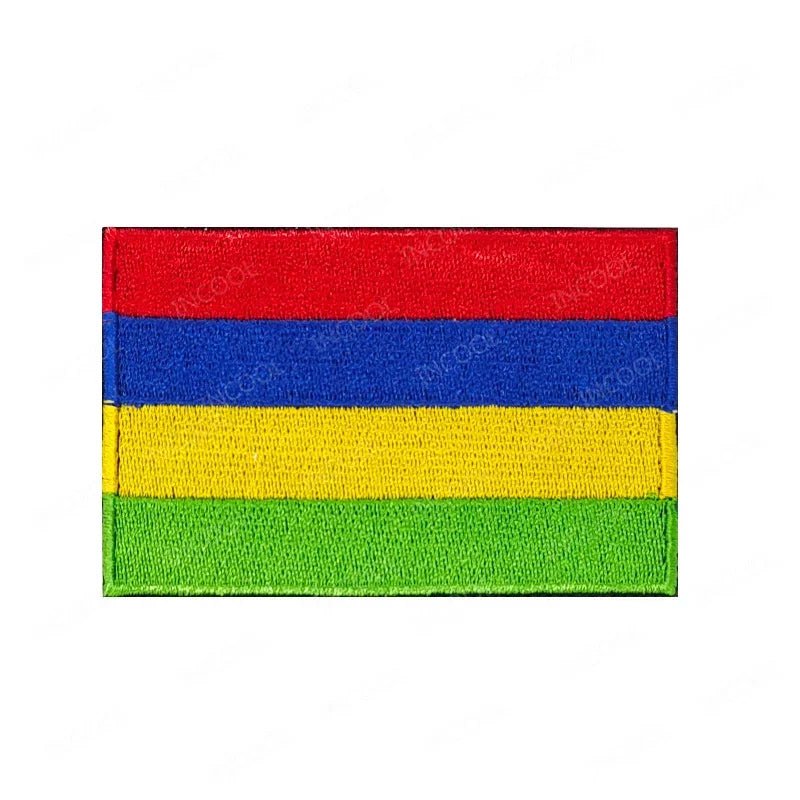 Set of African flags and badges embroidery patches featuring Morocco, Nigeria, Gabon, Libya, and Namibia by MANDOTOS INTERNATIONAL.