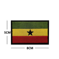 Embroidery patches of African flags and badges featuring Morocco, Nigeria, Gabon, Libya, and Namibia by MANDOTOS INTERNATIONAL.