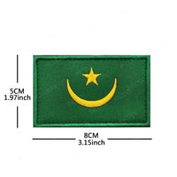 Embroidery patches of African flags and badges featuring Morocco, Nigeria, Gabon, Libya, and Namibia by MANDOTOS INTERNATIONAL.