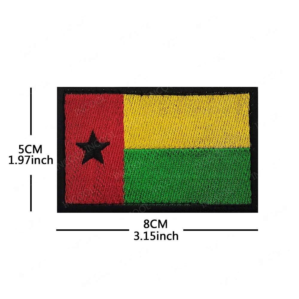 Embroidery patches featuring African flags and badges from Morocco, Nigeria, Gabon, Libya, and Namibia by MANDOTOS INTERNATIONAL.