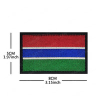 Embroidery patches of African flags and badges featuring Morocco, Nigeria, Gabon, Libya, and Namibia by MANDOTOS INTERNATIONAL.