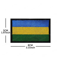 Embroidery patches of African flags including Morocco, Nigeria, Gabon, Libya, and Namibia by MANDOTOS INTERNATIONAL.
