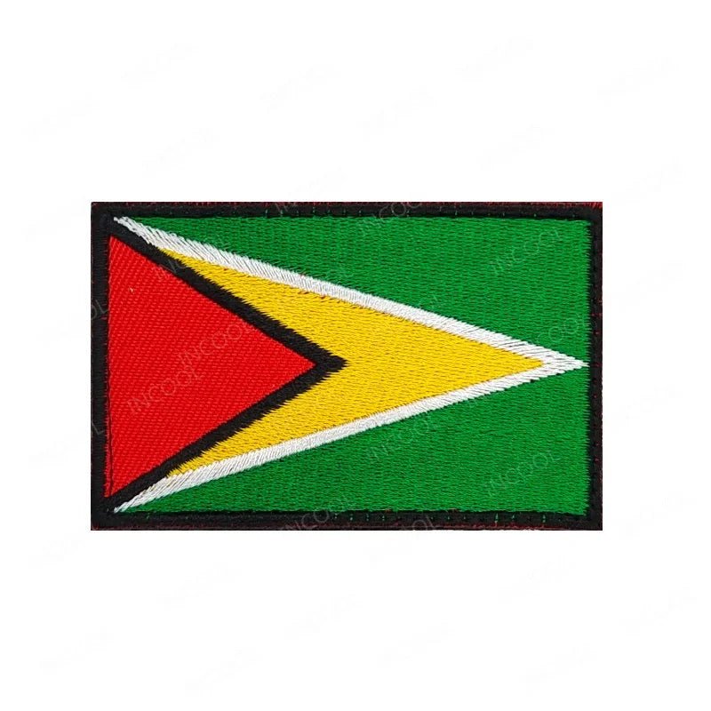 Embroidery patches featuring African flags and badges from Morocco, Nigeria, Gabon, Libya, and Namibia by MANDOTOS INTERNATIONAL.