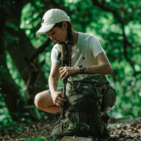 Mandotos International ANMEILU large capacity nylon backpack with multiple compartments for mountain camping, hiking, and travel.