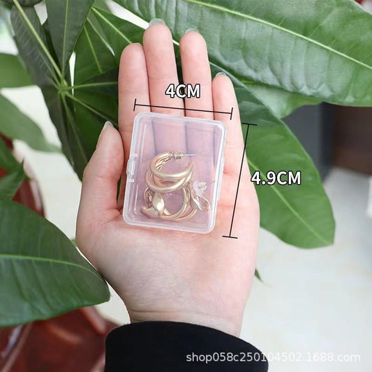 Mandotos International anti-oxidation multi-compartment jewelry storage box with organized sections for rings, necklaces, and earrings.