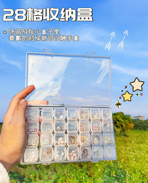 Mandotos International anti-oxidation multi-compartment jewelry storage box with organized sections for necklaces, rings, and earrings.