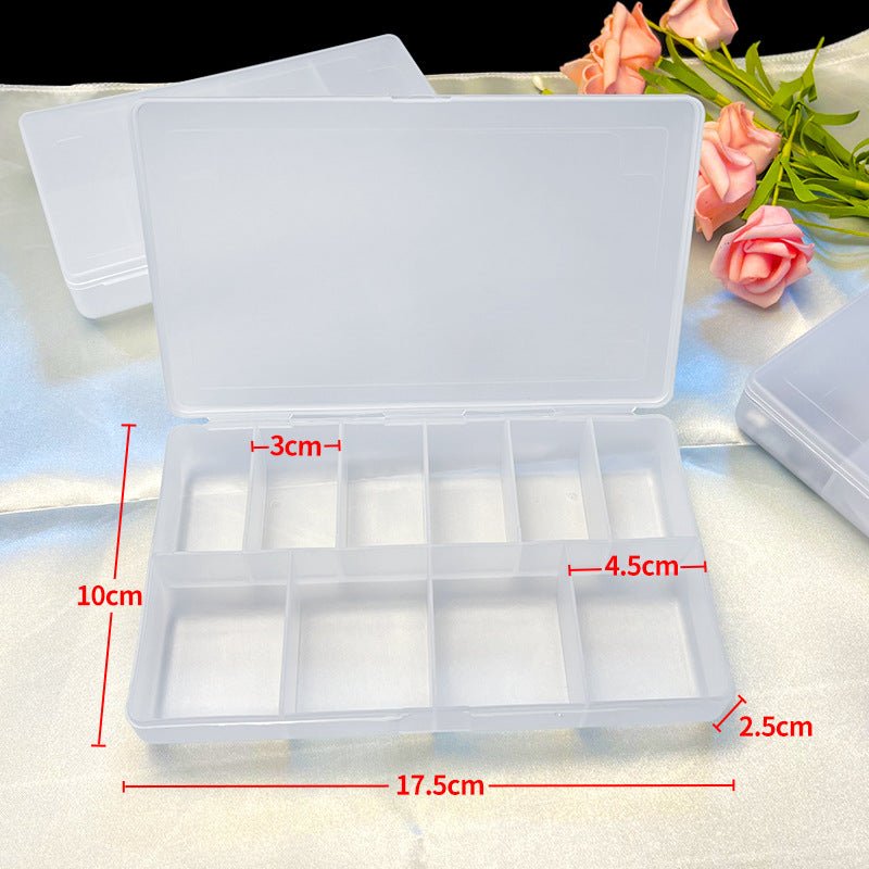 Mandotos International anti-oxidation multi-compartment jewelry storage box with various sections for organizing necklaces, rings, and earrings.