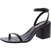 Audrina black leather sandals by MANDOTOS INTERNATIONAL featuring open toe design and ankle strap.
