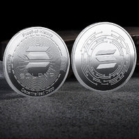 Mandotos International crypto coin collection featuring Bitcoin, Ethereum, Dogecoin, and more in a plastic case, made of metal.