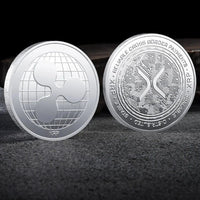 Physical metal crypto currency coin collection featuring Bitcoin, Ethereum, Dogecoin, and more by Mandotos International in a plastic case.
