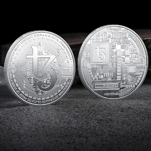Mandotos International collection of physical metal crypto coins including Bitcoin, Ethereum, Dogecoin, and more in plastic case.