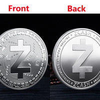 Mandotos International collection of physical metal crypto coins including Bitcoin, Ethereum, Dogecoin, and more in a plastic case.