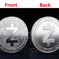 Mandotos International collection of physical metal crypto coins including Bitcoin, Ethereum, Dogecoin, and more in a plastic case.