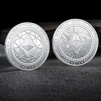 Mandotos International crypto coin collection featuring Bitcoin, Ethereum, Dogecoin, Ripple, and other metal coins in a plastic case.