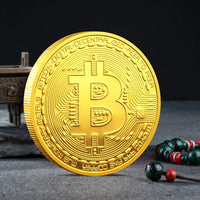 Mandotos International crypto coin collection featuring Bitcoin, Ethereum, Dogecoin, and more in a plastic case.