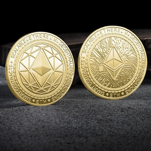 Mandotos International metal crypto coin collection featuring Bitcoin, Ethereum, Dogecoin, and more in a plastic display case.