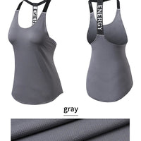 Black sleeveless yoga top for women by MANDOTOS INTERNATIONAL, backless fitness shirt with a comfortable, stretchy fit for active wear.