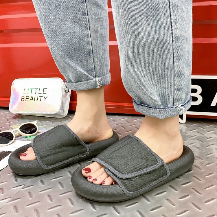 Mandotos International chic grey beach sandals with comfortable sole, featuring open toe design and casual summer style.