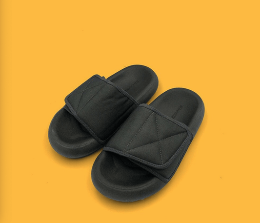 Chic grey beach sandals with comfort sole by MANDOTOS INTERNATIONAL, featuring a stylish design and cushioned footbed.