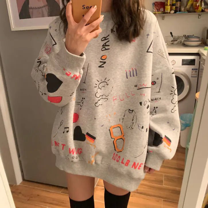 Chic loose women's thick long sleeve sweatshirt dress by MANDOTOS INTERNATIONAL, featuring a relaxed fit and cozy fabric.