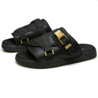 Chic unisex beach slides by MANDOTOS INTERNATIONAL with comfortable straps and stylish design for casual beachwear.