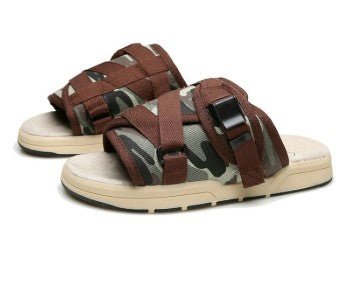 Chic unisex beach slides by MANDOTOS INTERNATIONAL featuring comfortable slip-on design and stylish casual look.