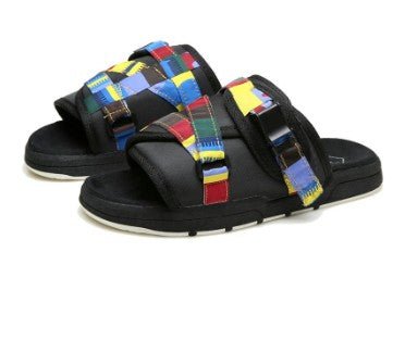Chic unisex beach slides by MANDOTOS INTERNATIONAL featuring stylish design and comfortable slip-on style for summer wear.