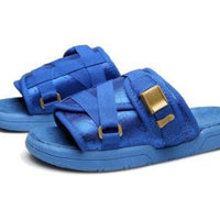 Unisex beach slides by MANDOTOS INTERNATIONAL featuring stylish design, comfortable straps, and casual slip-on style for summer wear.