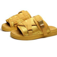 Chic unisex beach slides by MANDOTOS INTERNATIONAL featuring comfortable design and stylish slip-on style for summer.