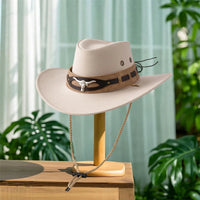 Unisex cowboy hat with wide brim, stylish felt design, offering sun protection, from MANDOTOS INTERNATIONAL.