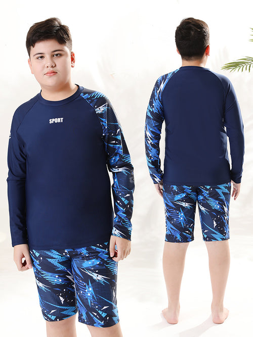 Children's boys' two-piece swim trunks by Mandotos International, sun-protective swimwear for older boys in a hot spring setting.
