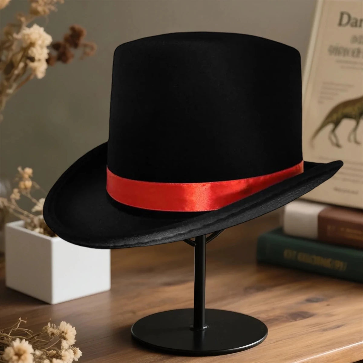 Elegant black top hat for adults, ideal for magician costumes, featuring a classic design by MANDOTOS INTERNATIONAL.