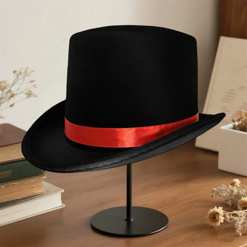 Elegant black top hat for adults, perfect for magician costumes, featuring a classic design by MANDOTOS INTERNATIONAL.