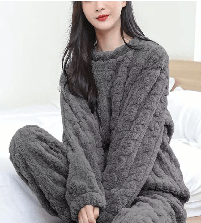 Cozy coral velvet sleepwear set by MANDOTOS INTERNATIONAL featuring a comfortable long-sleeve top and matching pants.