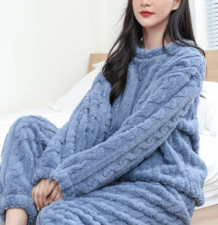 Cozy coral velvet sleepwear set by MANDOTOS INTERNATIONAL, featuring a soft, plush top and matching pants for comfortable lounging.
