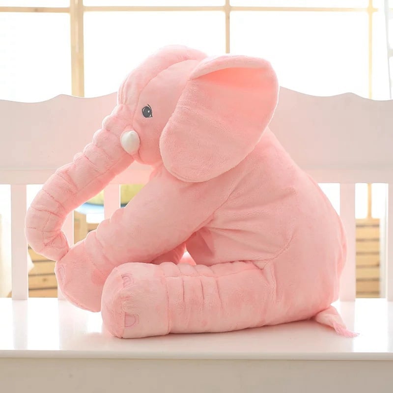 Soft plush Cuddly Elephant Sleep Pal by MANDOTOS INTERNATIONAL, shown lying down with floppy ears and gentle features.