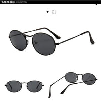 Round metal frame sunglasses with custom logo by Mandotos International, showcasing sleek design and premium metal construction.