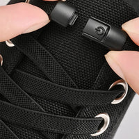 Elastic no-tie shoelaces with press lock from MANDOTOS INTERNATIONAL, suitable for kids and adults' sneakers, easy to secure.