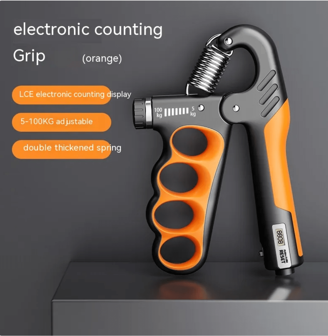 Electronic grip enhancer by MANDOTOS INTERNATIONAL showing a compact device with textured grip for improved handling.